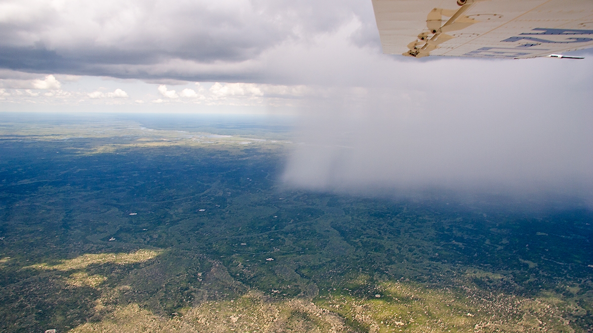 Dodging a rainstorm near Lebala